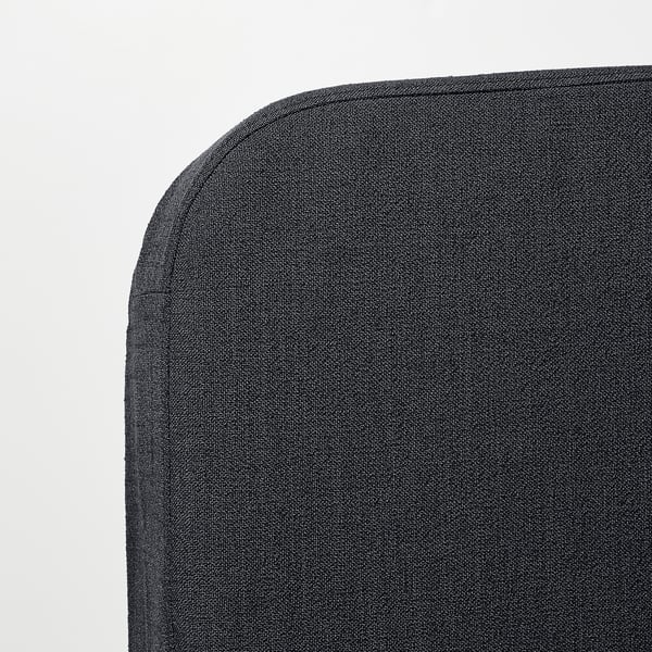 Dark grey sofa bed corner with clean lines and sturdy build, showcasing high-quality fabric and detailed stitching.