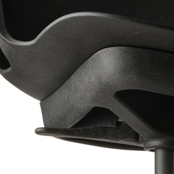 Black office chair close-up, showcasing robust seat and backrest join.