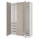 An open beige PAX wardrobe with shelves and drawers.