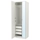 A white PAX wardrobe with mirrored doors, featuring drawers and shelves inside. It has a modern, sleek design.