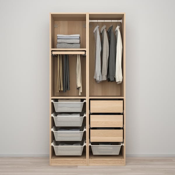 A compact wardrobe with drawers, hanging space, and baskets for organised storage.