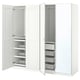A white PAX wardrobe with open doors revealing shelves and organisers inside.