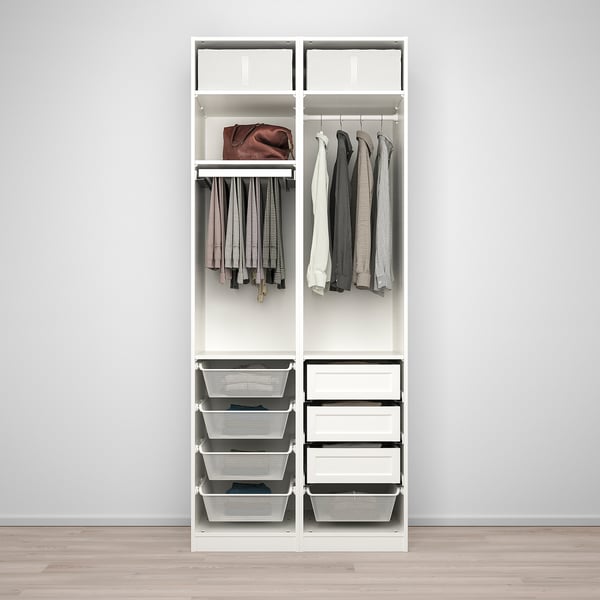 White wardrobe with shelves, hangers, and baskets. Clothes and handbag stored neatly.