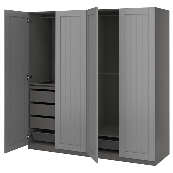Gray PAX wardrobe, open. Multiple shelves and drawers for organized storage.
