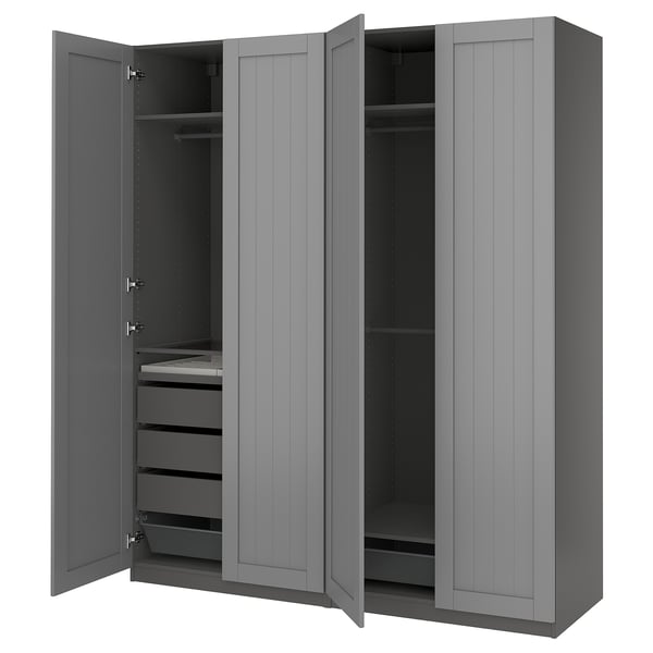 A gray PAX wardrobe with open doors, revealing shelves and drawers.