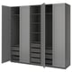 Gray PAX wardrobe with open doors revealing shelves and drawers.