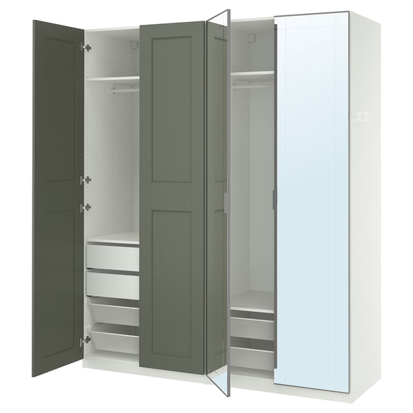 This image shows an open, modern wardrobe named PAX with green and white colours, featuring shelves, drawers, and a mirror door.