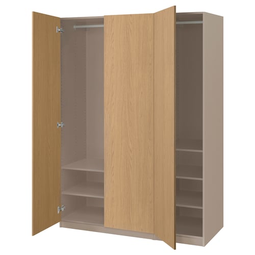An open wooden PAX wardrobe with shelves.