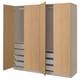 Wooden PAX wardrobe with mesh baskets, drawers, and open compartments. Light beige finish, modern design.