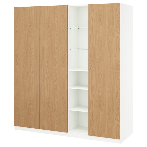 Wooden PAX wardrobe with two doors and five shelves for clothing.