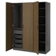 An open PAX wardrobe in oak with dark grey shelves and mesh baskets for storage.