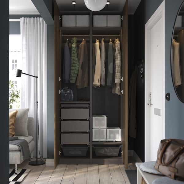 Modern wardrobe with drawers, shelves, and hanging space, featuring adjustable feet and integrated lighting.