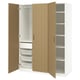 A white and light wooden PAX wardrobe with open doors, displaying shelves and mesh drawers.
