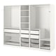 A white IKEA PAX wardrobe with adjustable shelves and metal mesh baskets for storage.