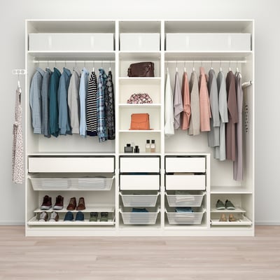 PAX wardrobe organises clothing with shelves, drawers, and mesh baskets for air circulation and adjustable feet for floor levelling.