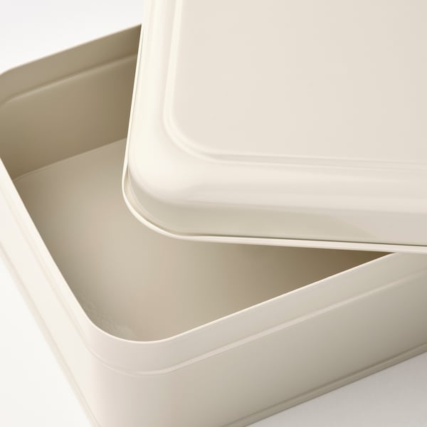 Stylish metal box with glossy finish; stacks neatly for efficient storage.