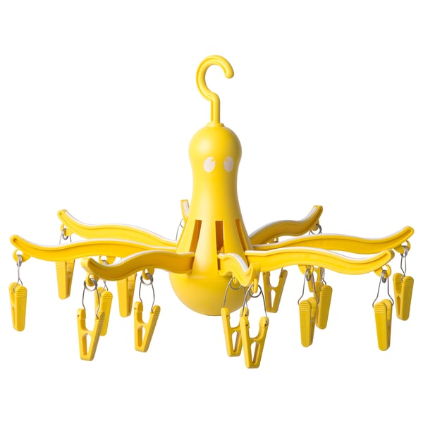 Bright yellow PRESSA dryer with 16 pegs, octopus-like design, hangs anywhere.