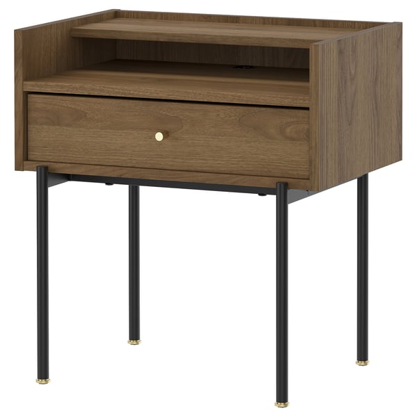 The RÅDMANSÖ bedside table warm walnut tones, a single drawer, and an open shelf, supported by black metal legs.