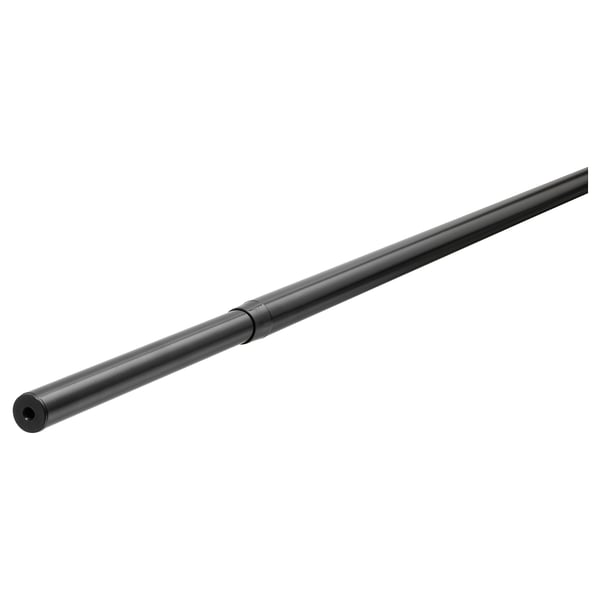 A black flexible curtain rod named RÄCKA, adjustable and made from steel with a powder-coated finish, lying horizontally.