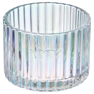 A clear, iridescent glass candle holder RÄFFELBJÖRK with vertical grooves.