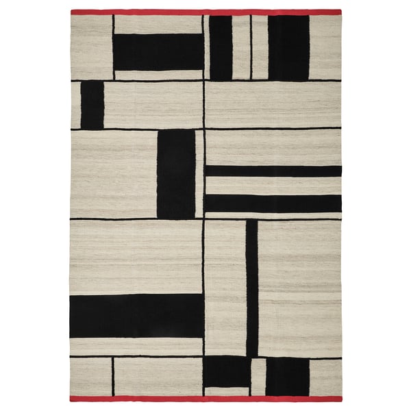 RASTPLATS rug. Beige and black rectangular pattern, red edges. Rectangular, wool and cotton blend.