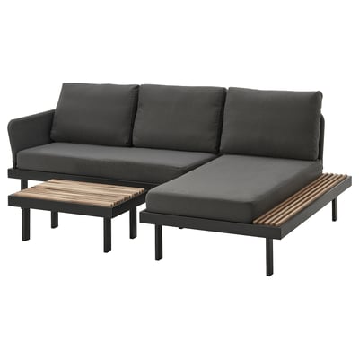 Modern black outdoor sectional sofa set with sleek, angular design, including a sofa, ottoman, and coffee table with wooden slats.
