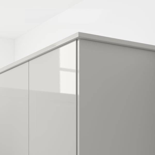 Close-up of modern, grey glossy cabinet edge, showing clean, wipeable surface.