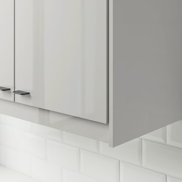 Modern grey gloss cabinet edges, hiding lighting and cords under kitchen cabinets.