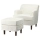 White armchair & ottoman, curved backs & legs, fabric & wood.