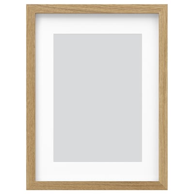 RÖDALM frame, natural oak, modern design, rectangular shape, empty with grey mat, wood grain texture.