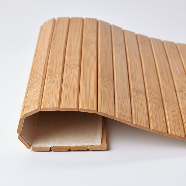 Bamboo tray with sturdy, grooved design; natural finish, neatly cut edges.