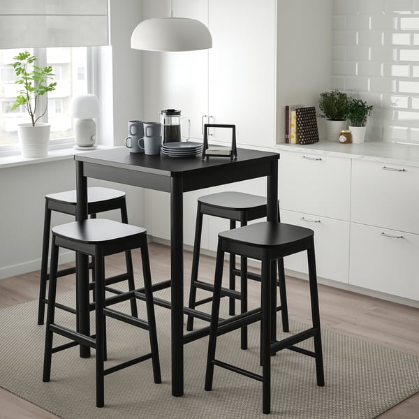 Small black RÖNNINGE 4-seat dining set fits cosy spaces.