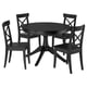 Black ROSENTORP extendable round dining table with four chairs. Scratch-resistant, expandable, and sturdy wooden legs.