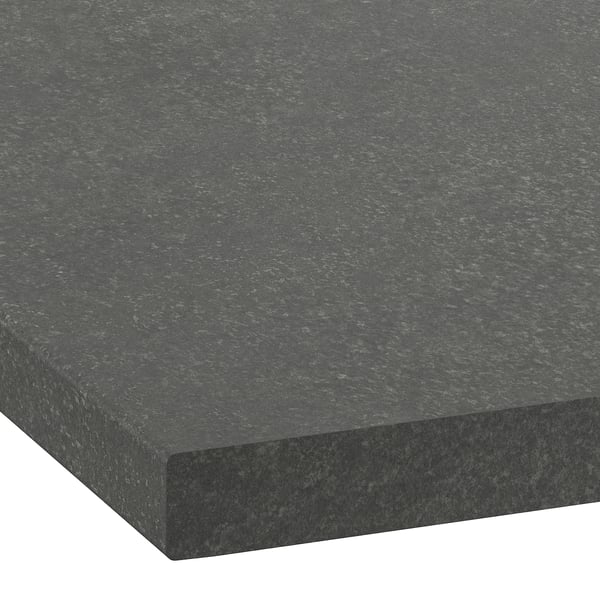 Dark speckled countertop with smooth, even surface and rounded edges. Looks durable, clean, and modern.