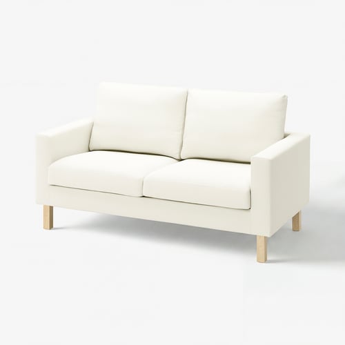 SALTSJÖBADEN white sofa, sleek and modern design, cushion seating, light texture fabric, wooden legs.