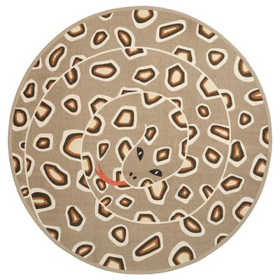 Circular rug, sand-colored with snake pattern. A coiled snake graphic, rubber backing for grip. Neutral tones, cotton material.