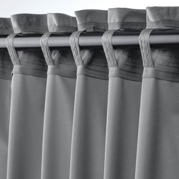 Close-up of SANDSVINGEL curtains heading tape, showing tabs for easy hanging and creating pleats with hooks.