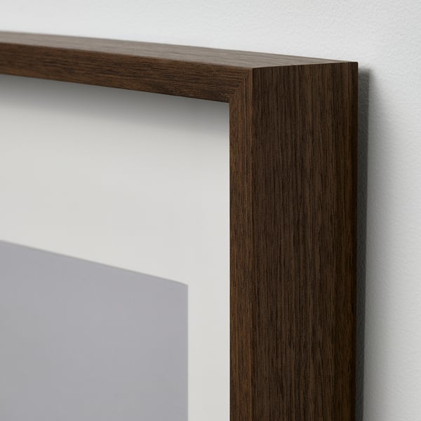 Wooden frame on white wall, high quality, deep frame.