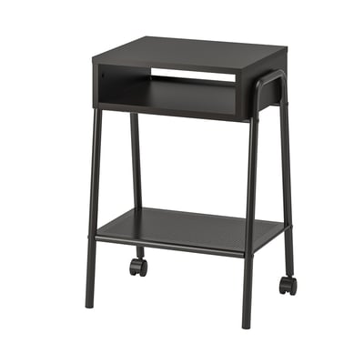 Black bedside table with wheels, rectangular shape and perforated bottom shelf. Modern design with one open compartment.