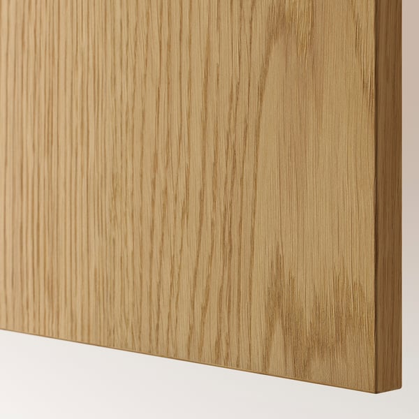 Close-up of a smooth, light wooden panel, crafted from oak veneer, showcasing fine grain texture and high-quality finish.