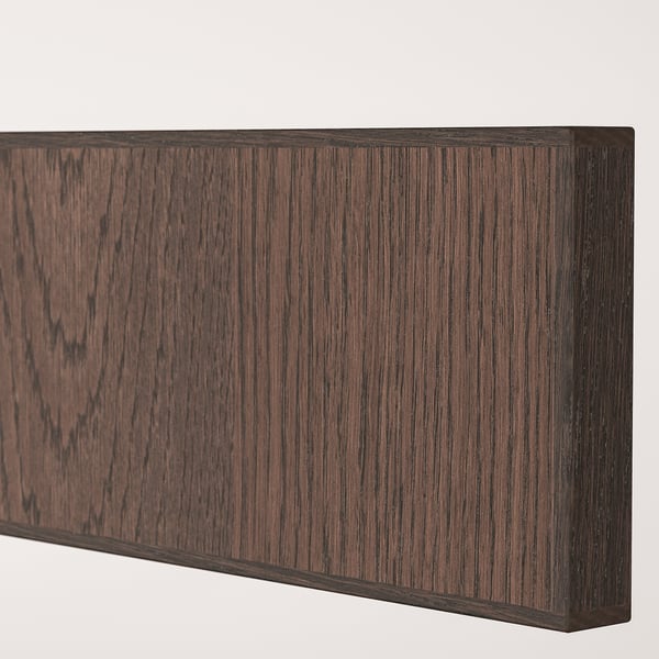 Dark wooden panel with visible oak grain texture, finished with polished edges.