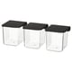 Three clear plastic SKÅDIS storage boxes with black lids, square shape, organised neatly. Ideal for organising small items.