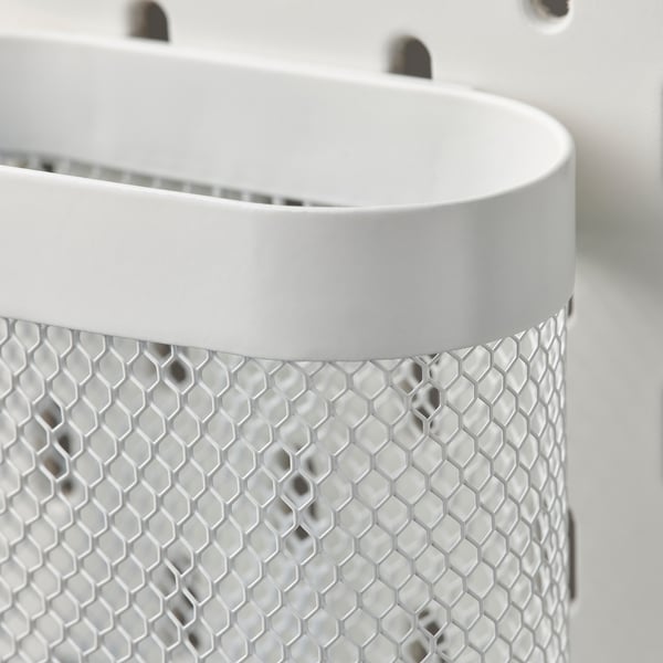 SKÅDIS metal mesh organiser: durable, powder-coated steel with a hexagonal design for organising small items.