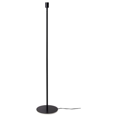 SKAFTET black floor lamp with round base and cylindrical tube, powder-coated steel and plastic.