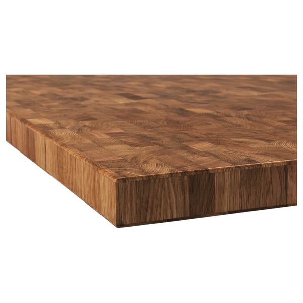 Wooden countertop with a warm, natural grain. The end-grain design adds rustic charm, and the finish gives it a smooth, polished look.