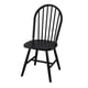Black wooden chair, arched back, spindle design. Solid acacia wood. Classic, durable.