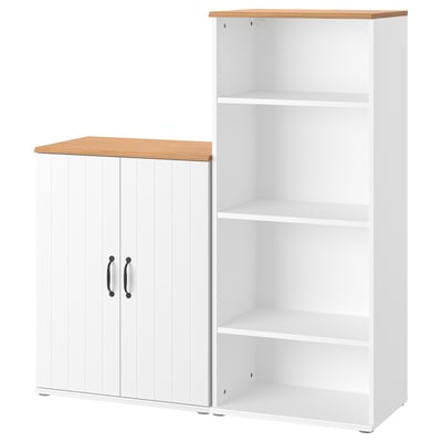 A white SKRUVBY storage unit set, including a cabinet with doors and a bookcase, both with light wooden tops.