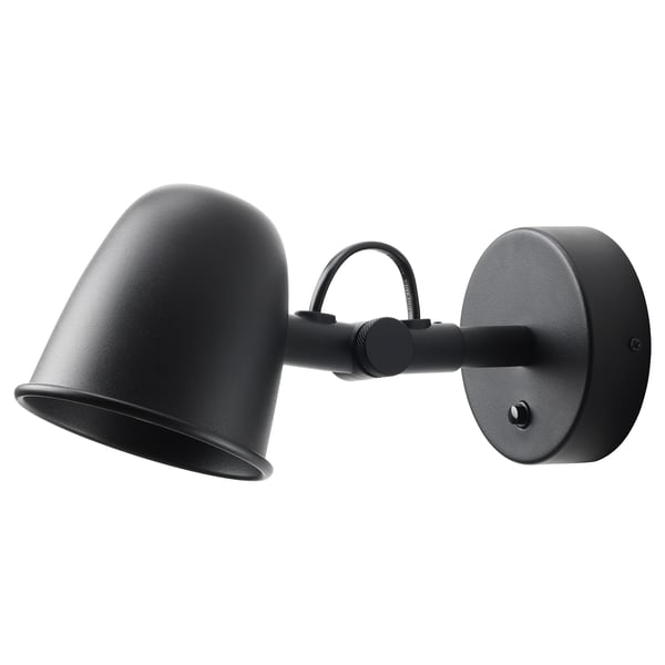A SKURUP black metal wall lamp with a bell-shaped shade and adjustable arm.
