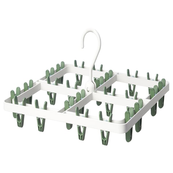 Depicts a white SLIBB laundry hanger with 24 green clothes pegs.