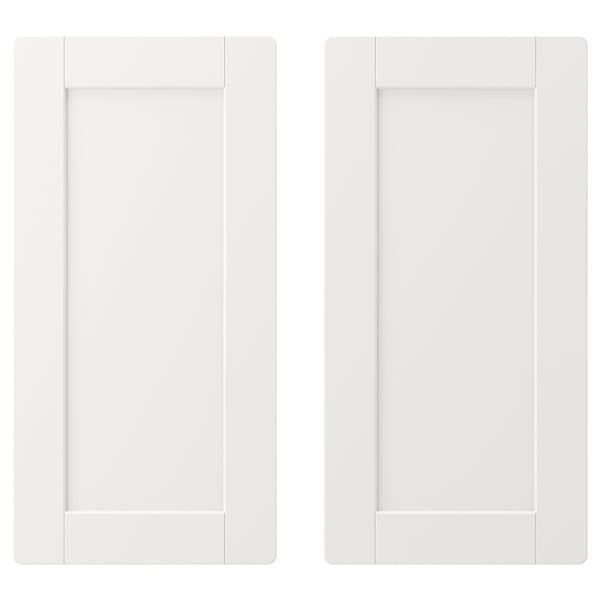 Two white rectangular wardrobe doors with wide frames and rounded corners.